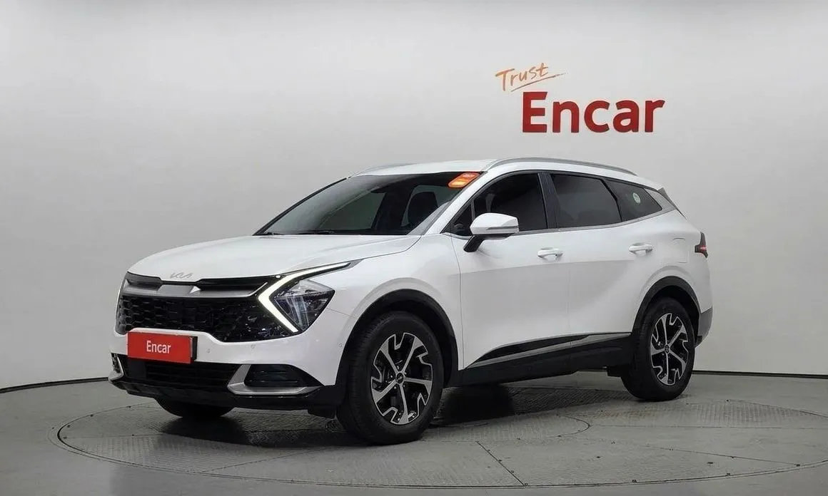 Kia Sportage — фото 1