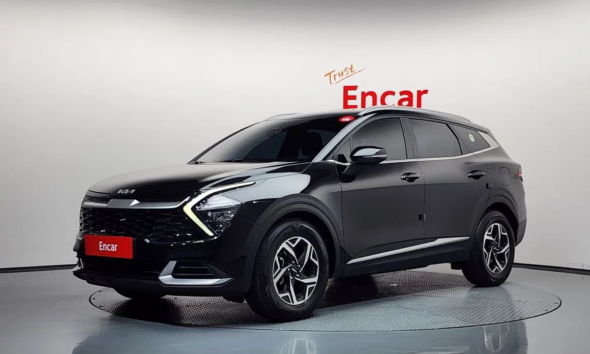 Kia Sportage — фото 1