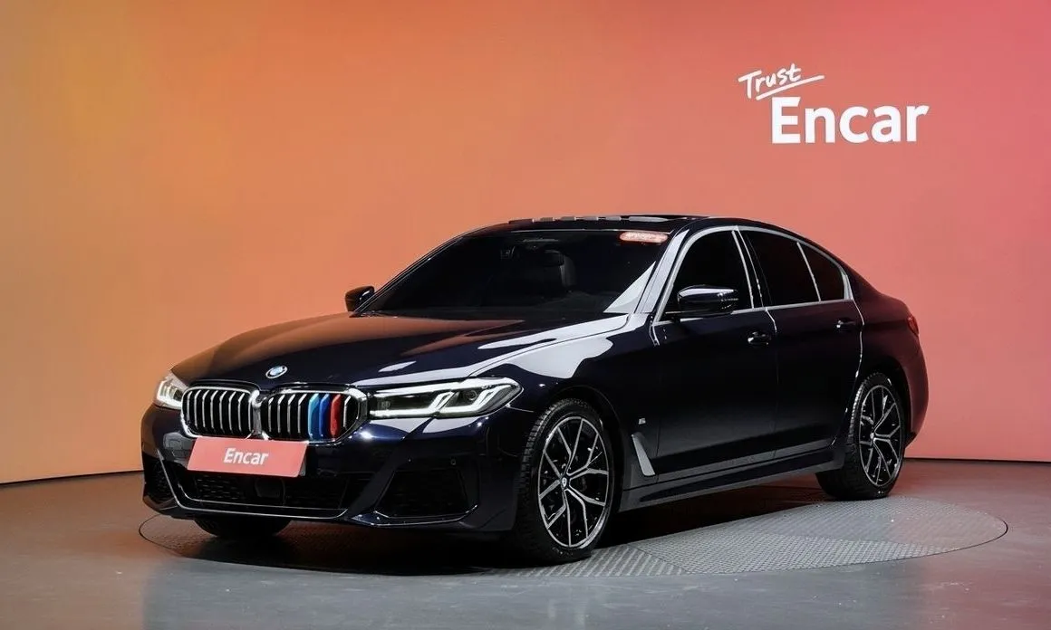 BMW 5-Series — фото 1
