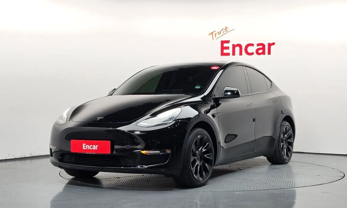 Tesla Model Y — фото 1