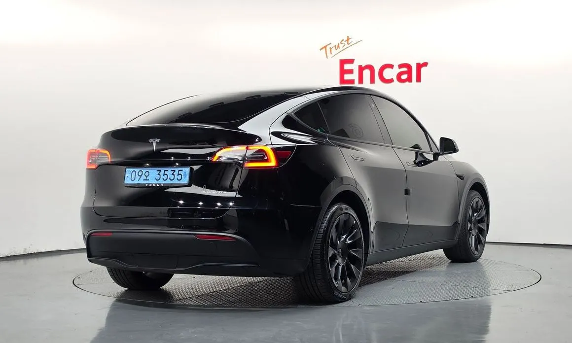 Tesla Model Y — фото 9