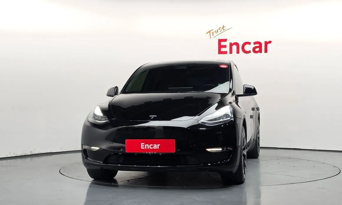 Tesla Model Y — фото 10