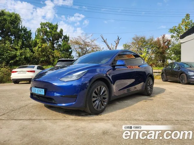 Tesla Model Y — фото 1