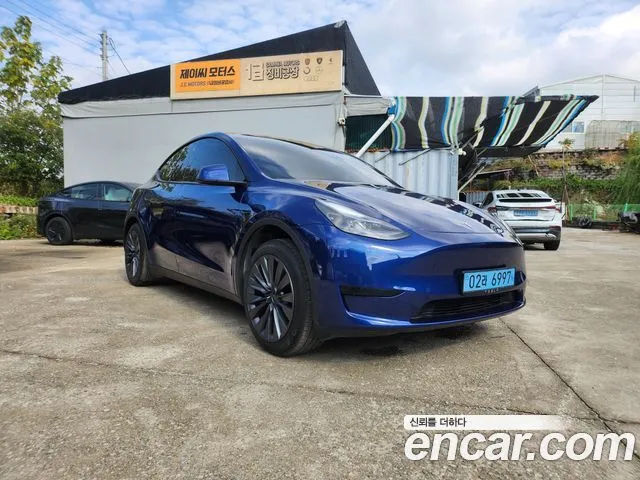 Tesla Model Y — фото 8