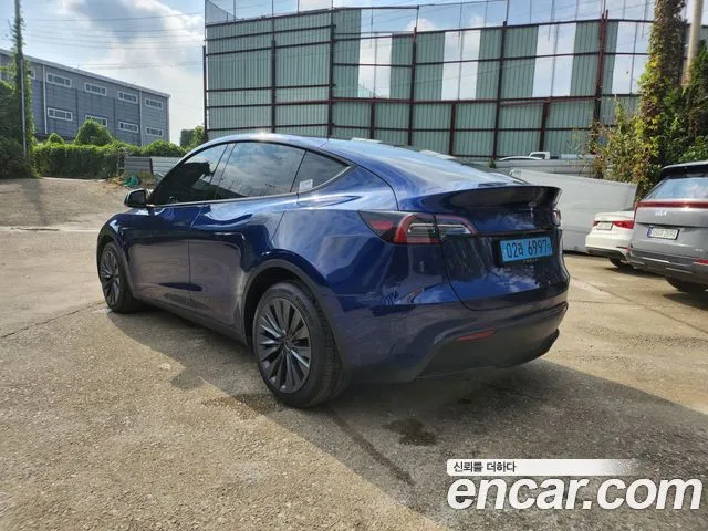 Tesla Model Y — фото 6