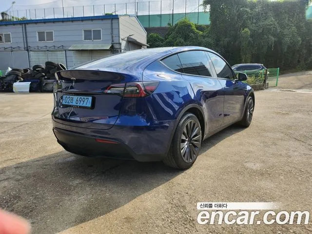 Tesla Model Y — фото 9