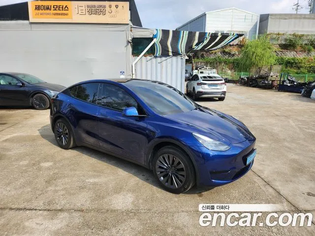 Tesla Model Y — фото 10