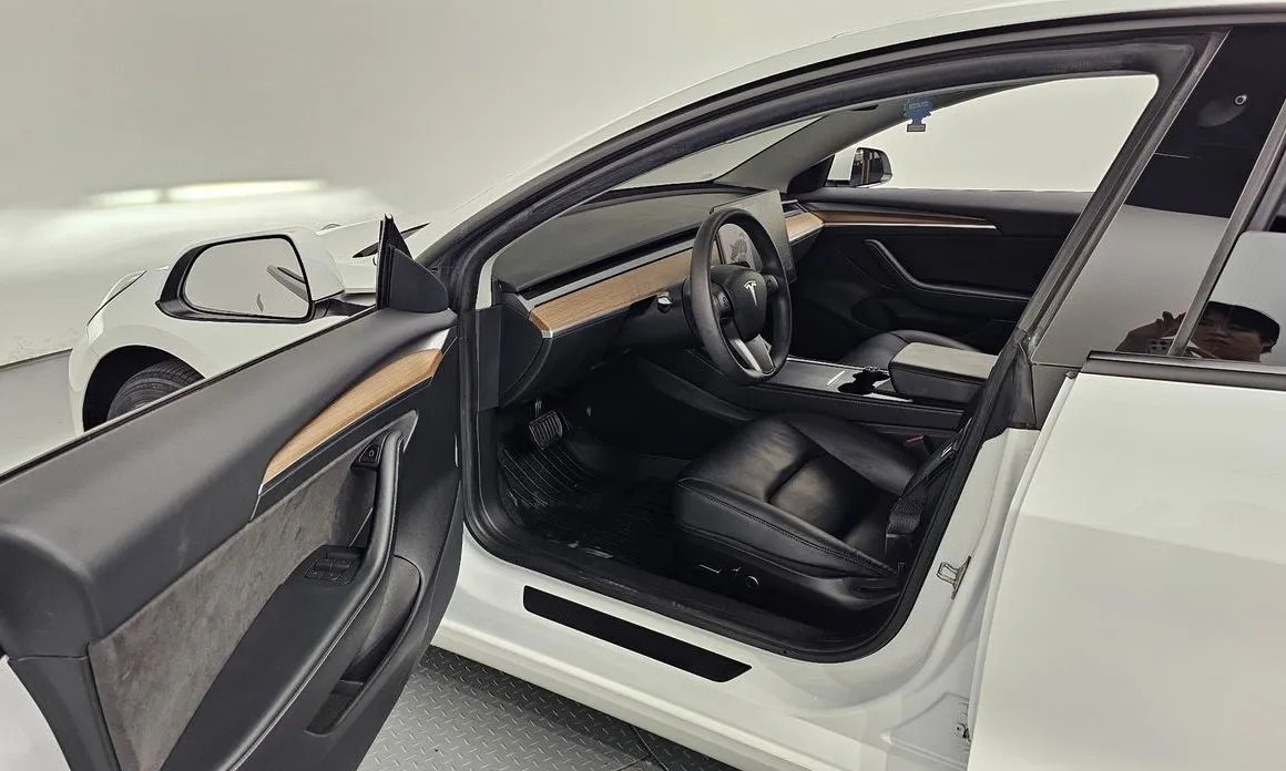 Tesla Model 3 — фото 8