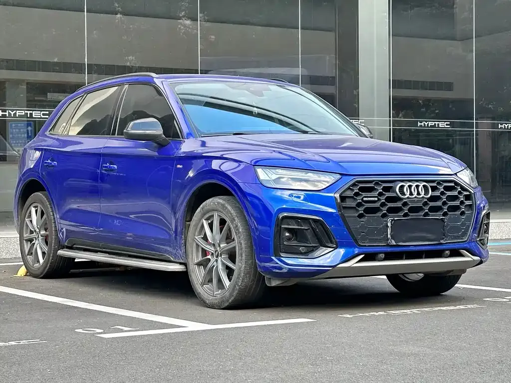 Audi Q5L — фото 10