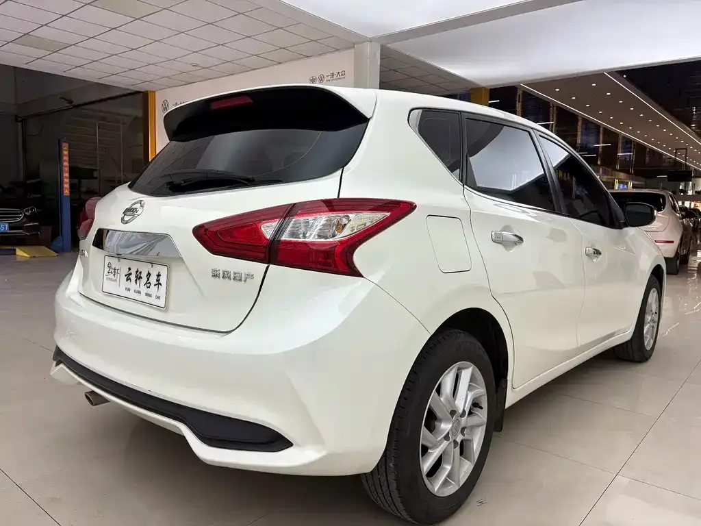 Nissan Tiida — фото 10