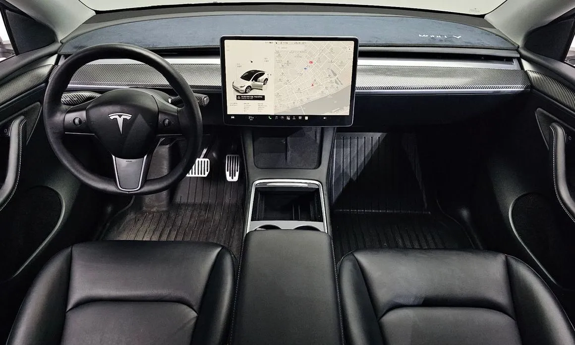 Tesla Model Y — фото 9