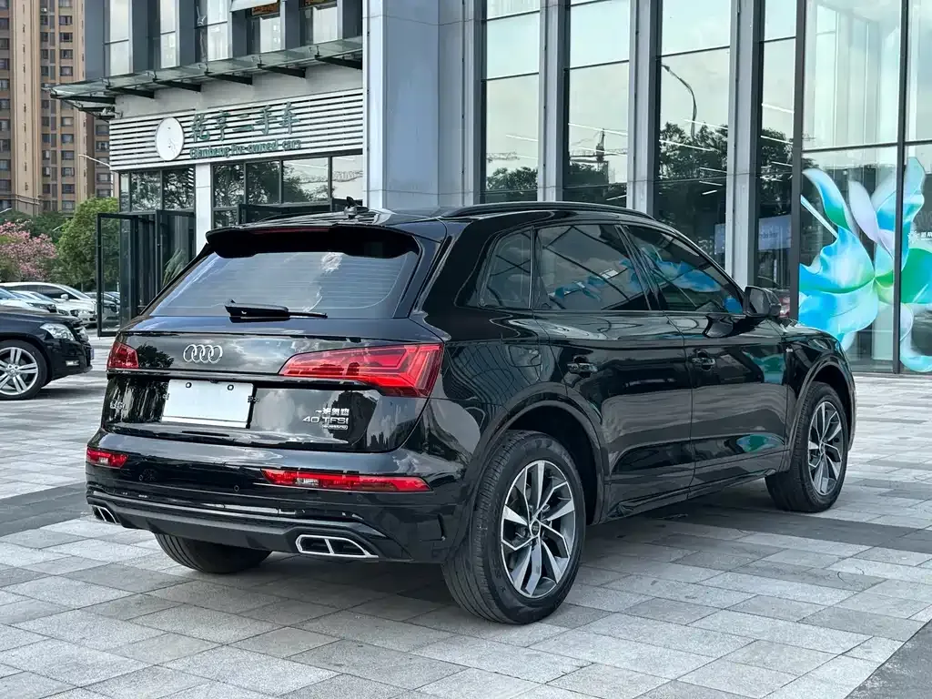 Audi Q5L — фото 8