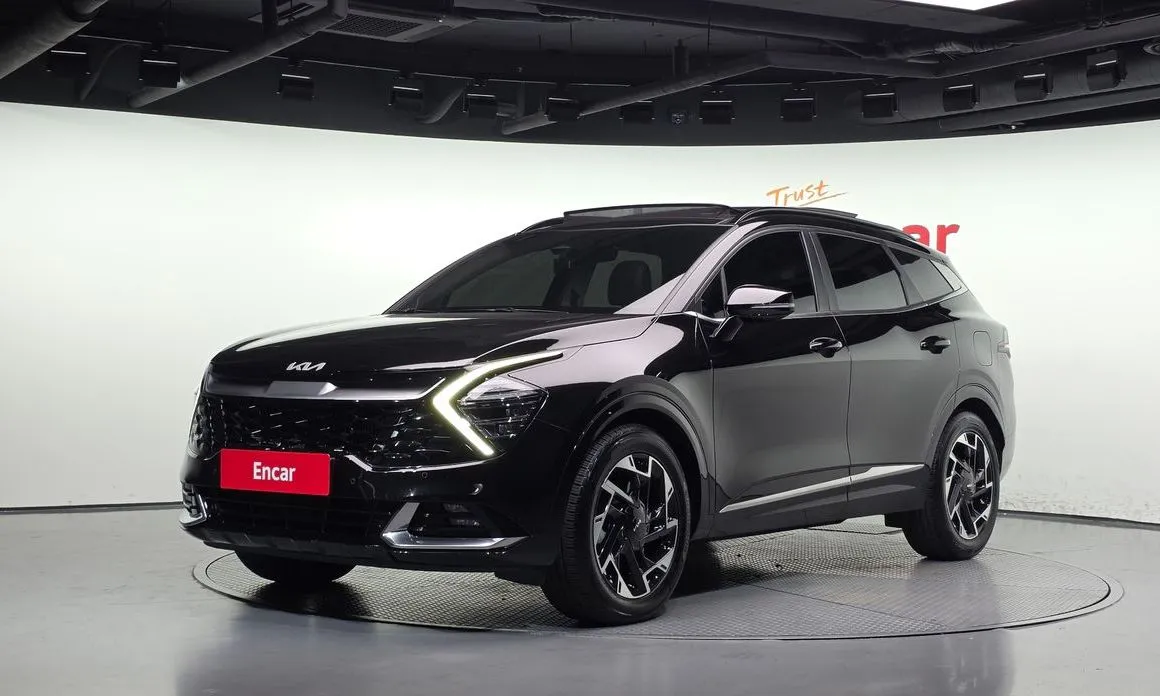 Kia Sportage — фото 1
