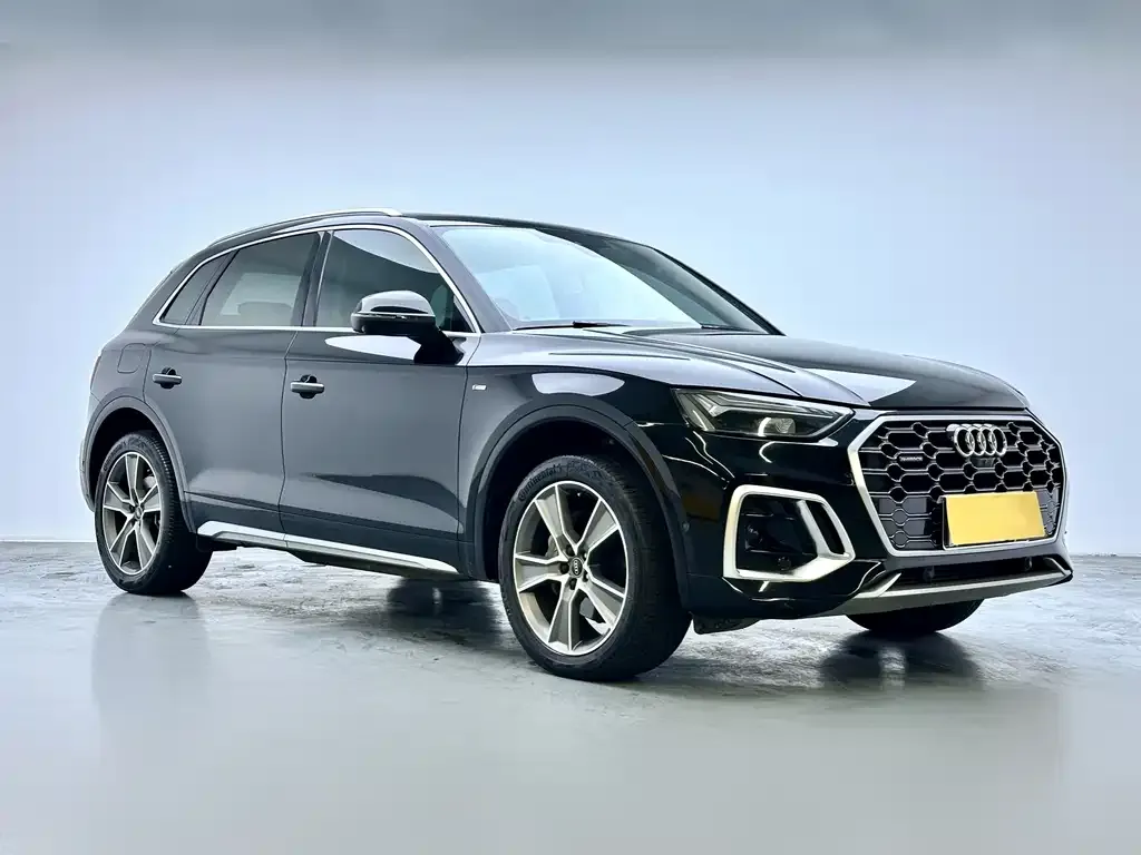 Audi Q5L — фото 6