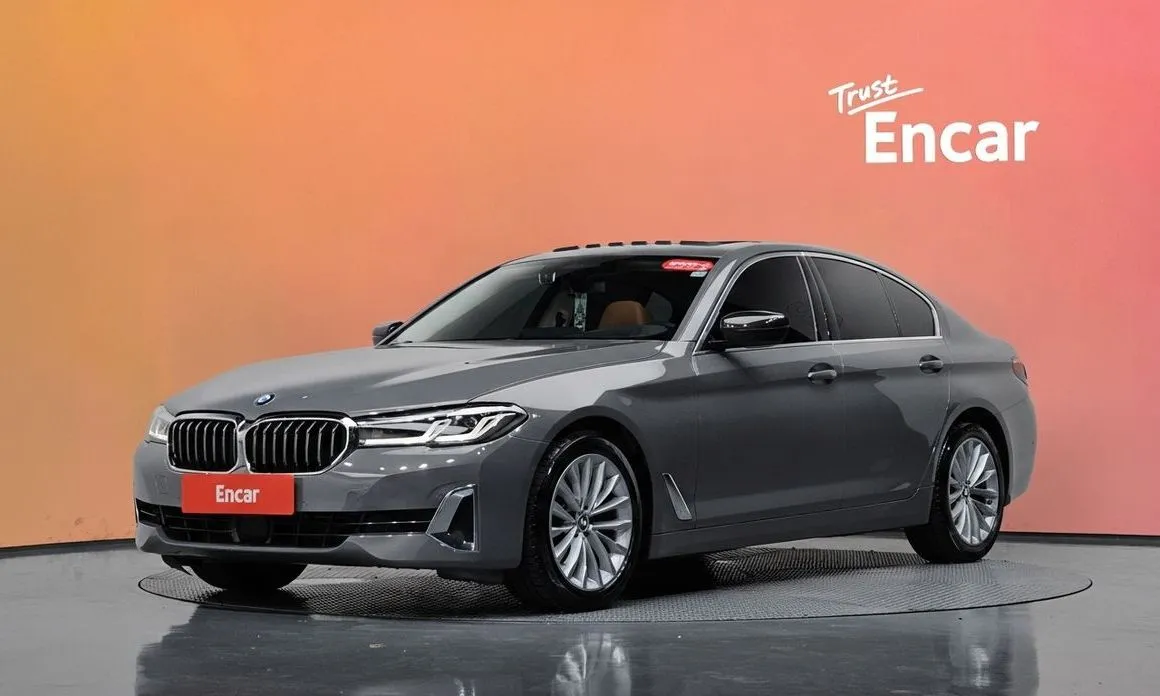 BMW 5-Series — фото 1