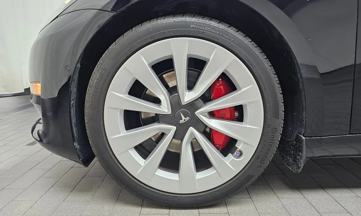 Tesla Model 3 — фото 10