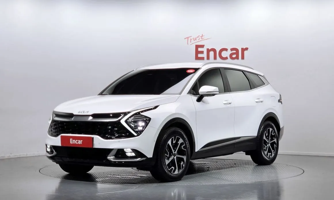 Kia Sportage — фото 1