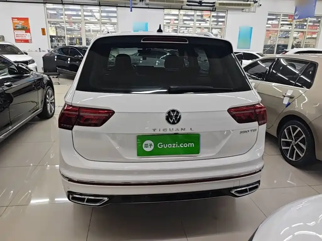 Volkswagen Tiguan L — фото 1