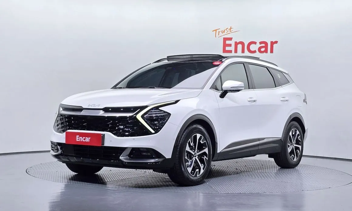 Kia Sportage — фото 1