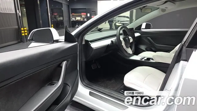 Tesla Model 3 — фото 10