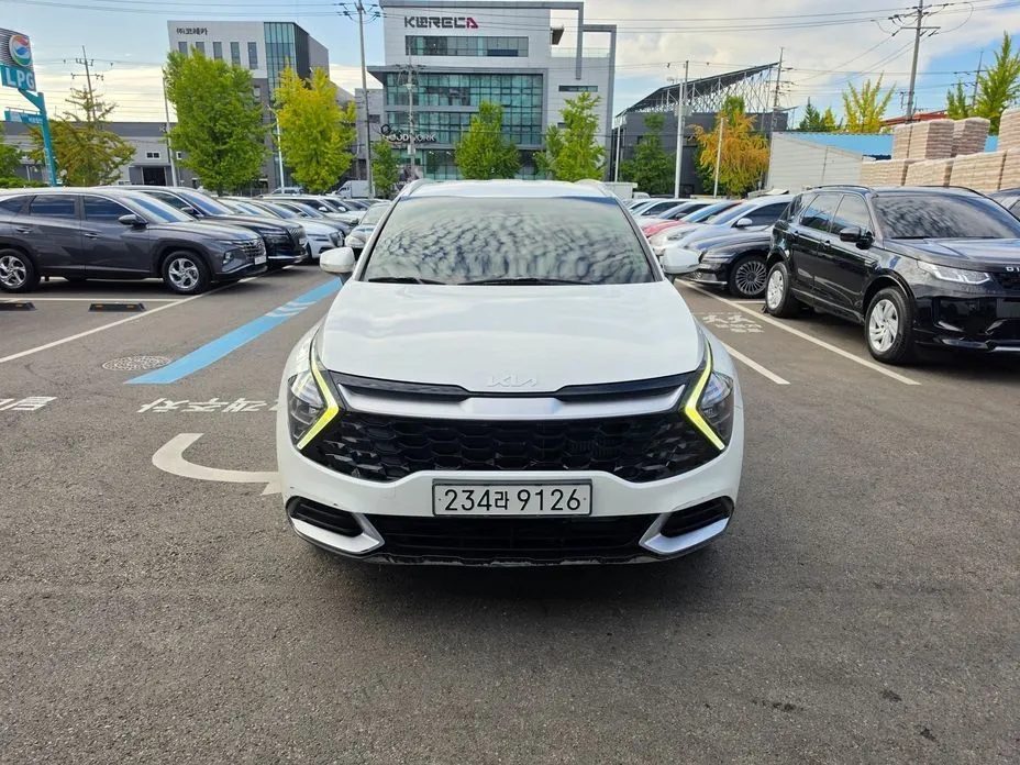 Kia Sportage — фото 1