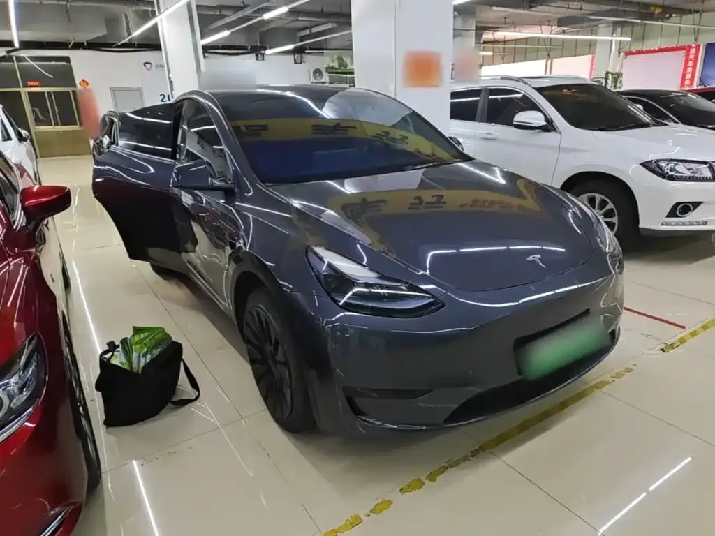 Tesla Model Y — фото 8