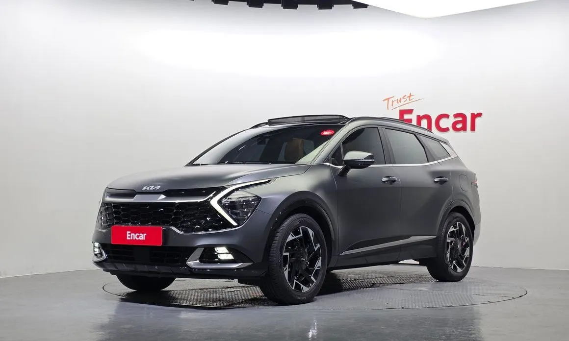 Kia Sportage — фото 1