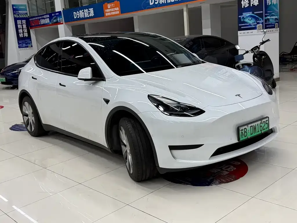 Tesla Model Y — фото 8