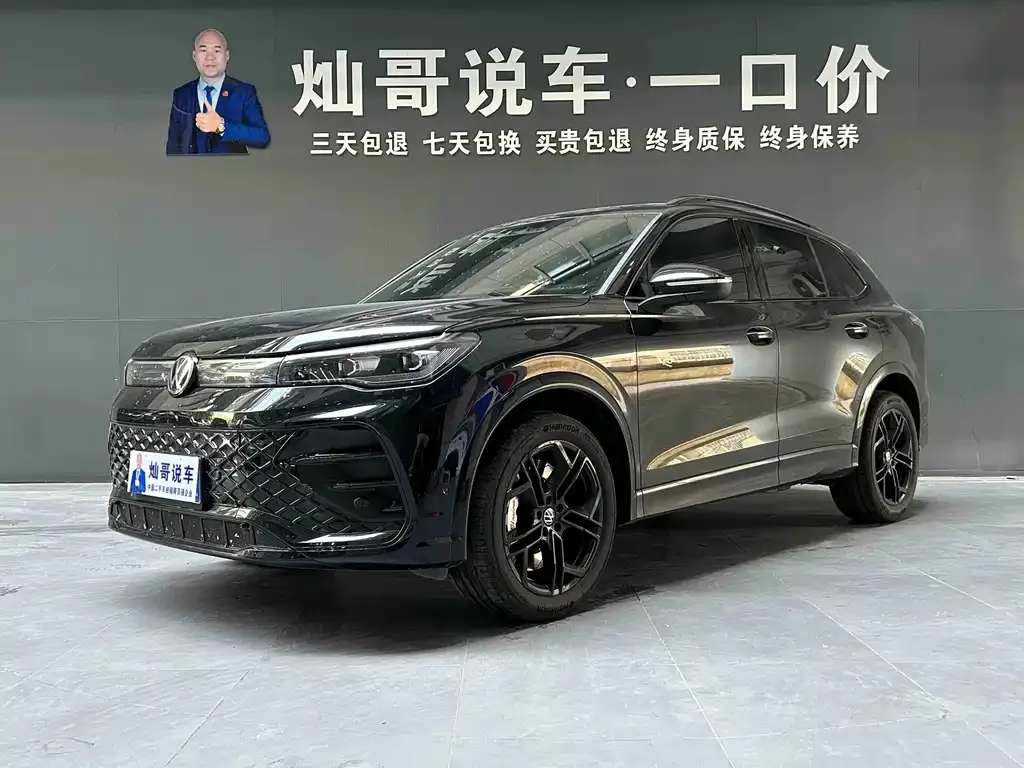 Volkswagen Tiguan L — фото 1